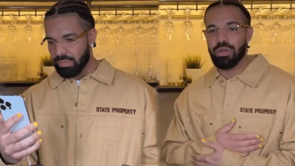 Drake applies nail polish.